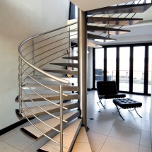 cool-black-barcelona-chair-with-ottoman-idea-also-moderns-spiral-staircase-design-with-stainless-steel-railing